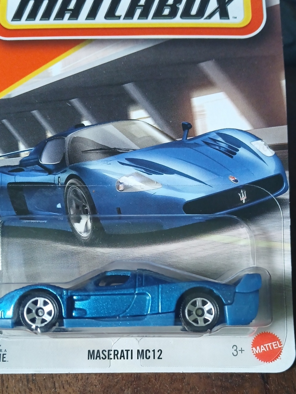 Match blue Maserati MC12 die-cast sports car
